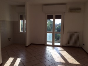 Soggiorno con angolo cottura