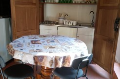 1 - soggiorno con angolo cottura a scomparsa